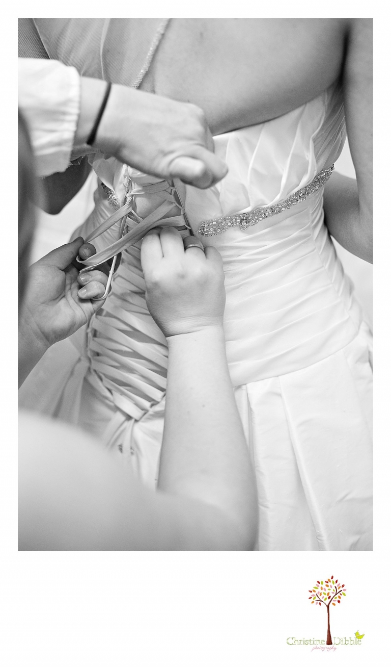 Best Newborn Photographer in Sonora, CA Christine Dibble Photography takes photos of a newborn baby girl asleep in baskets, beaded bowls, and with her parents as she sleeps in wraps and furs.