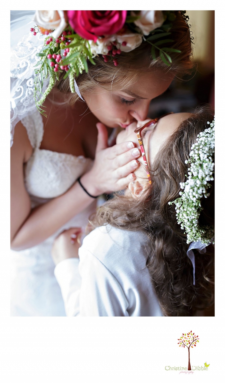 Sonora wedding photographer Christine Dibble Photography  photographs the bride and her stepdaughter before a  sunset beach wedding at Moran Lake Beach in Santa Cruz.