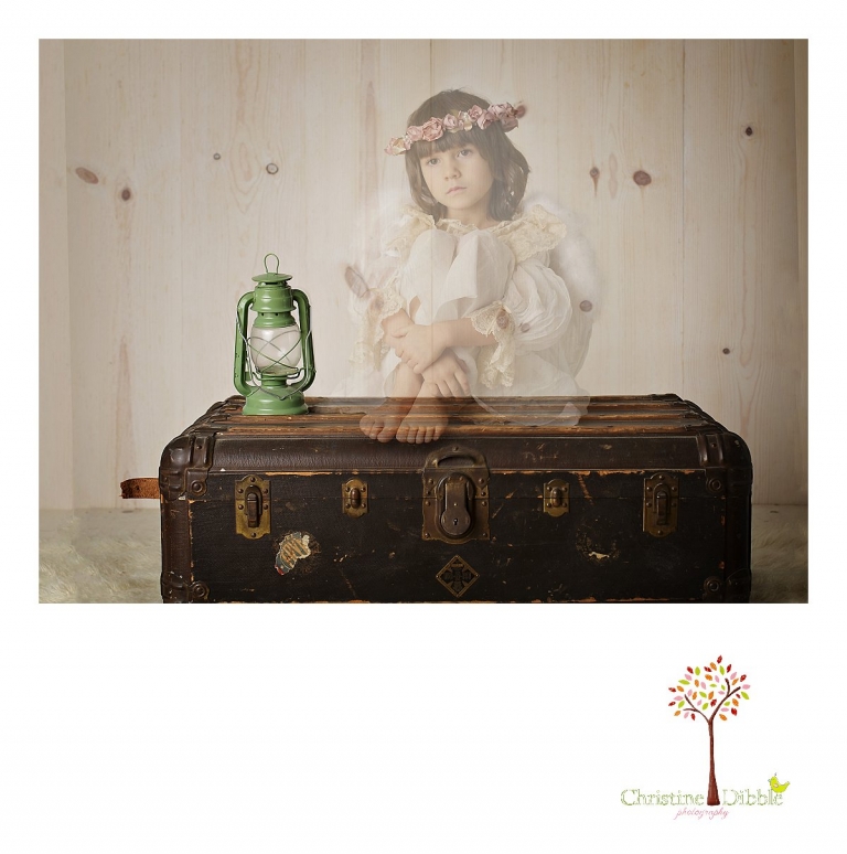 Sonora childrens photographer Christine Dibble Photography takes photos of a child as a ghost in an antique flower girl dress from the 1800's.