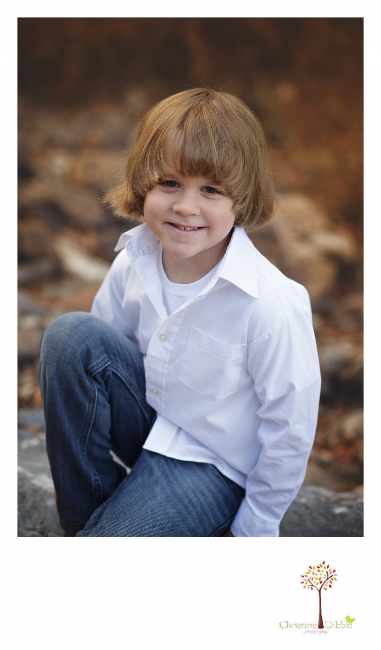 Sonora and Murphys family photographer  Christine Dibble Photography takes a head shot of a young boy child during a Murphys family photography session.