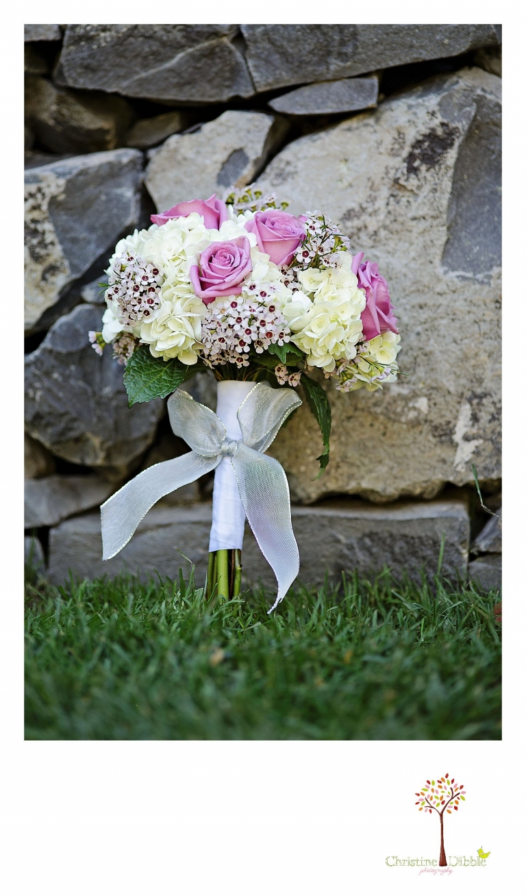 Christine Dibble Photography, Sonora and Reno wedding photographer, photographs a wedding bouquet.