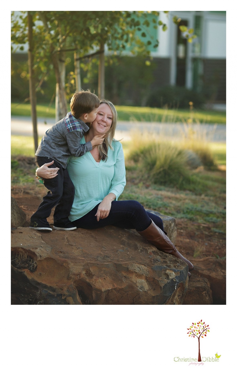 Sonora photography by Christine Dibble Photography captures photos of a little boy kissing his mom on the cheek during mini sessions at Sierra College in Grass Valley.