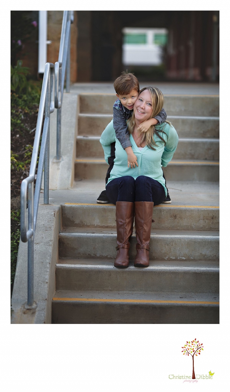 Sonora photography by Christine Dibble Photography captures photos of a little boy sitting on stairs with his mom during mini sessions at Sierra College in Grass Valley.