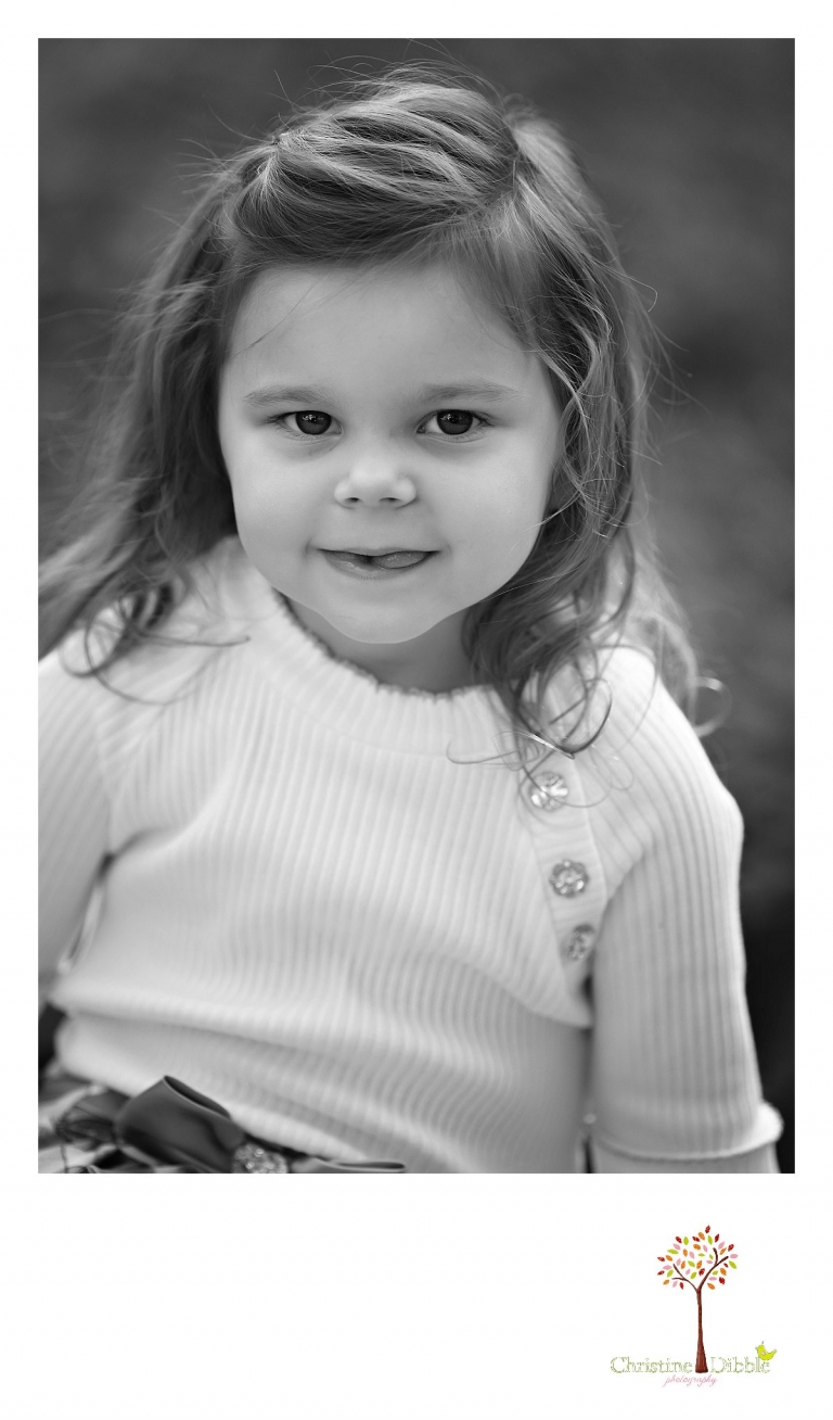 Sonora photography by Christine Dibble Photography captures a black and white head shot of a little girl during mini sessions at Empire Mine State Park in Grass Valley.