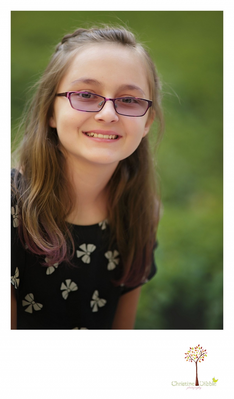 Sonora photography by Christine Dibble Photography captures head shot photos of a tween girl during mini sessions at Empire Mine State Park in Grass Valley.