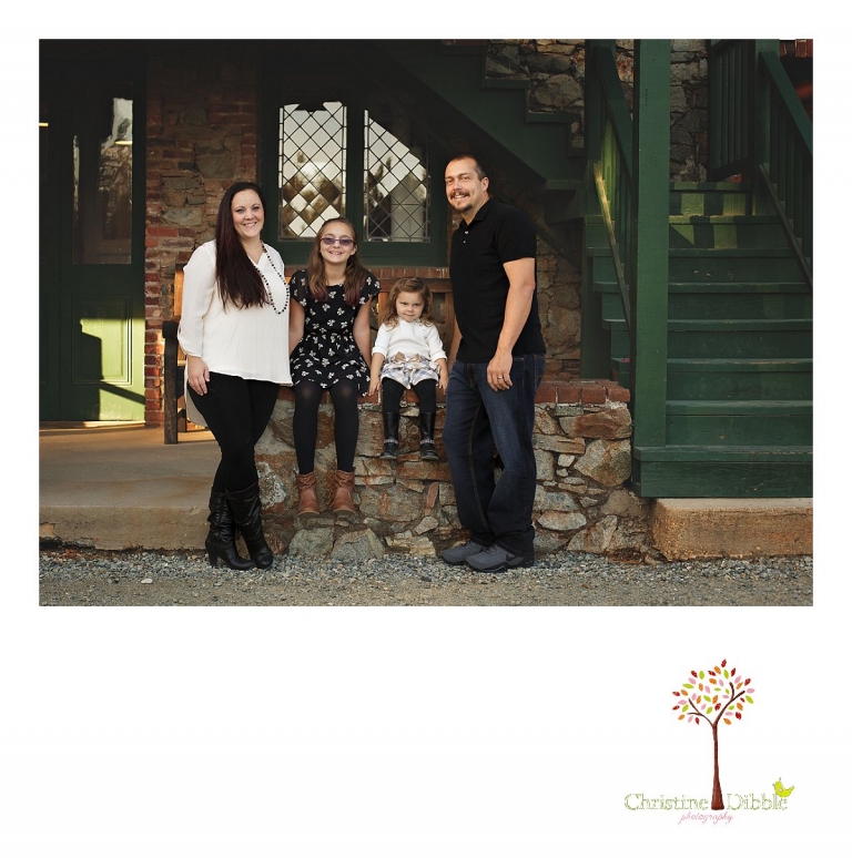 Sonora photography by Christine Dibble Photography captures photos of a family on a porch of an old building during mini sessions at Empire Mine State Park in Grass Valley.