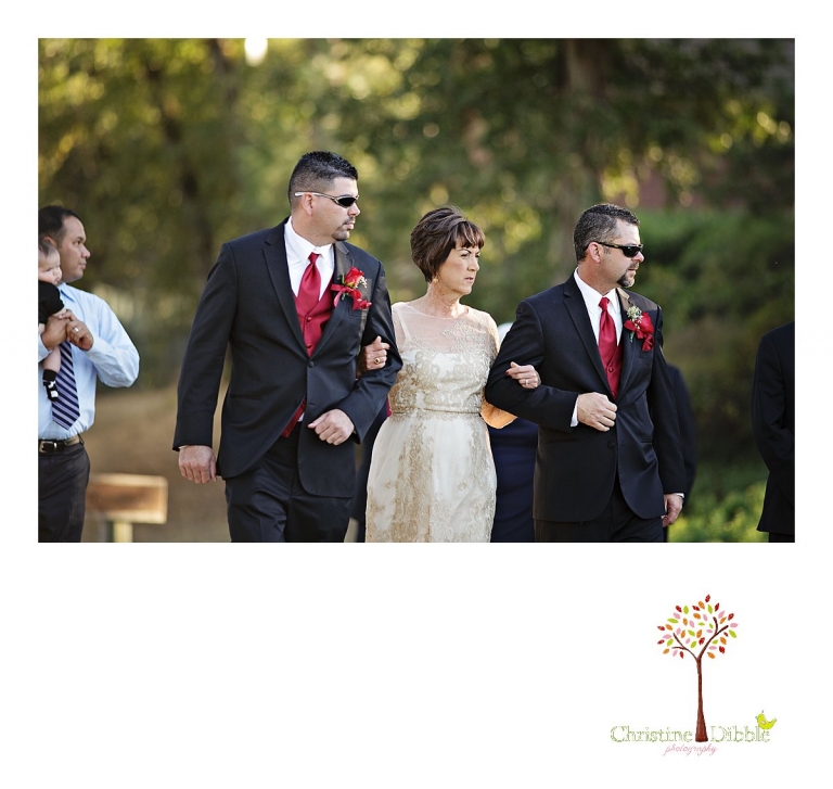 Christine Dibble Photography of Sonora photographs the groom and his best man brother escort their mother down the aisle before the Indigeny Reserve wedding.