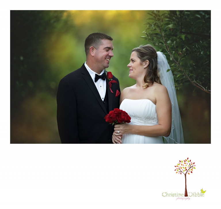 Christine Dibble Photography of Sonora photographs a smiling bride and groom during their portrait session in the orchards after their golden hour Indigeny Reserve wedding.