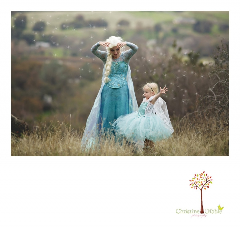Sonora Elsa photographer Christine Dibble Photography photographs the beautiful princess Elsa as she and a little girl make snow fly.