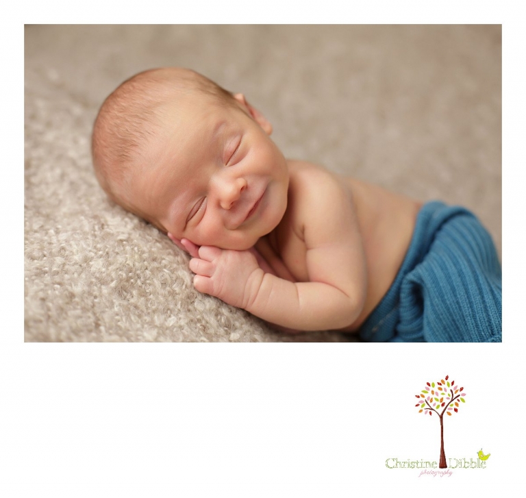 Best Sonora newborn photography by Christine Dibble Photography includes newborn portraits of a baby boy as he smiles in his sleep.