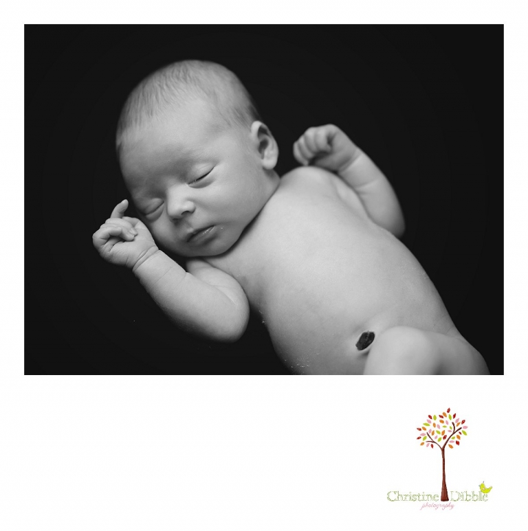 Best Sonora newborn photography by Christine Dibble Photography includes newborn portraits of a baby boy in a womb-like black and white image.