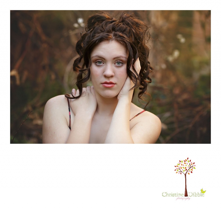 Sonora, CA senior model photographer Christine Dibble takes outdoor modeling photos of a teenage girl for a modeling portfolio wearing Free People and showing off her big blue eyes.