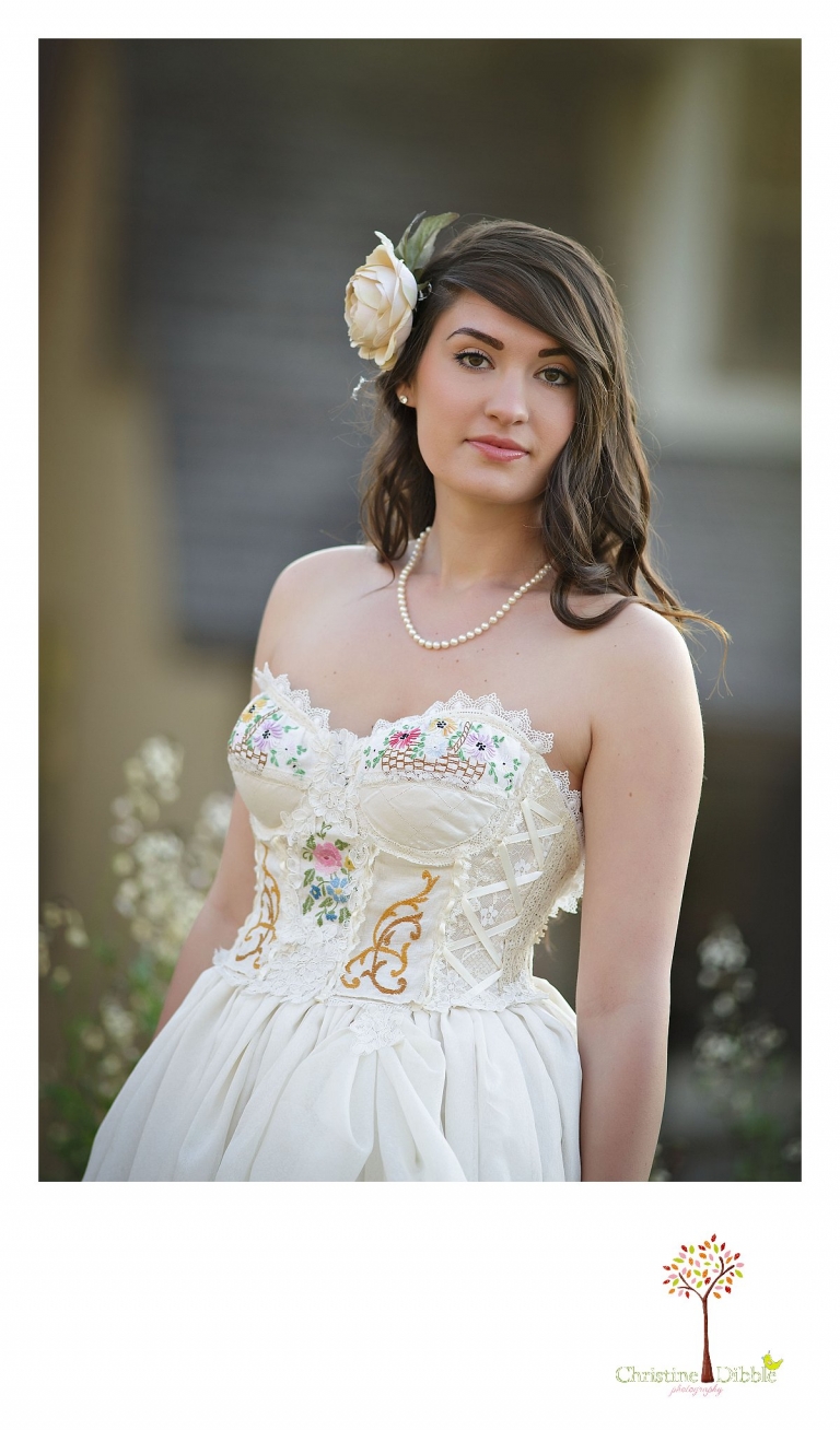 Sonora wedding photographer Christine Dibble Photography takes outdoor sunset photos of a model wearing a dress crafted of vintage linens and a hair flower by Hopefully Romantic near Twain Harte.
