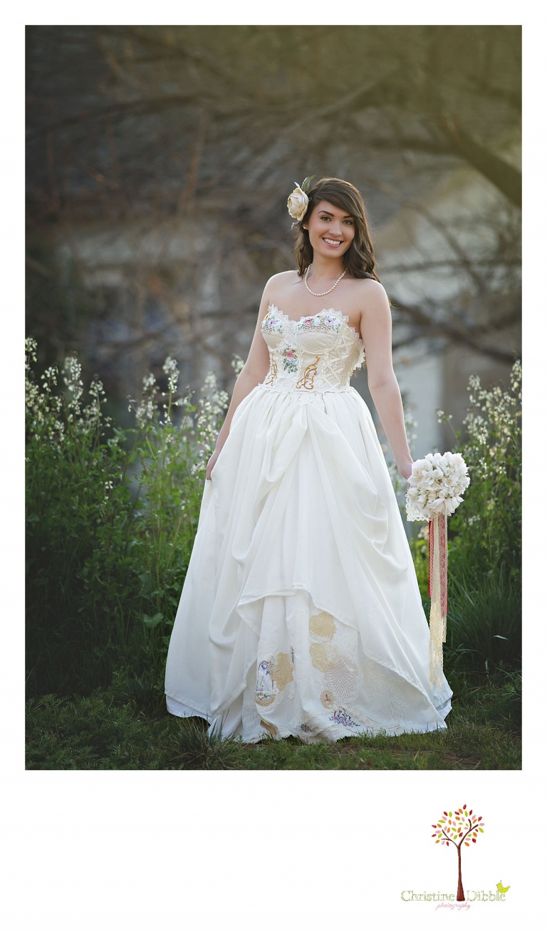 Sonora wedding photographer Christine Dibble Photography takes outdoor sunset photos of a model wearing a dress crafted of vintage linens and a hair flower by Hopefully Romantic near Twain Harte.