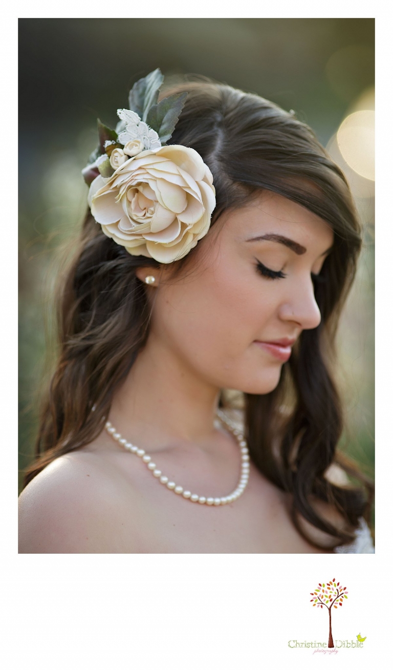 Sonora wedding photographer Christine Dibble Photography takes outdoor sunset photos of a model wearing a hair flower by Hopefully Romantic near Twain Harte.
