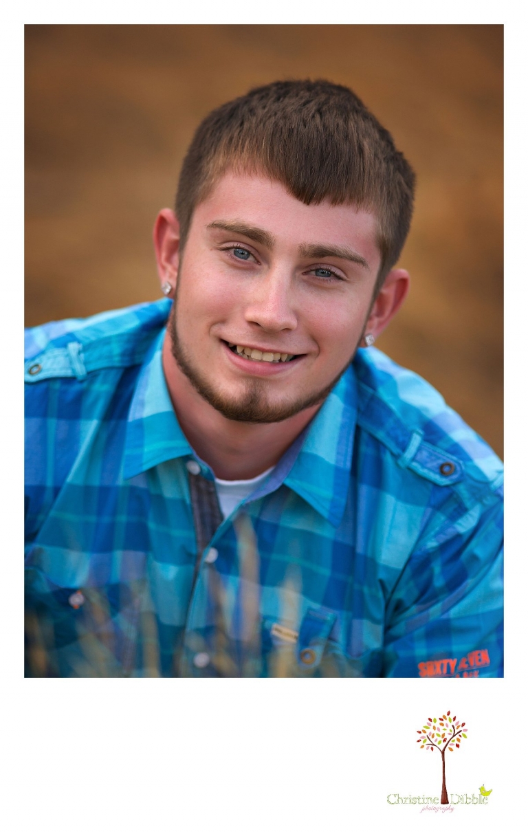 Sonora, Summerville and Turlock senior portrait photographer Christine Dibble Photography takes outdoor senior photos and head shots of a senior boy with gorgeous blue eyes.