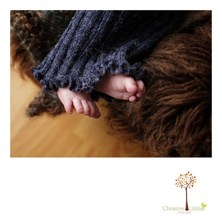 Best Sonora, CA newborn photographer Christine Dibble Photography takes studio photos of a baby boy's tiny feet and toes during his newborn photography session.
