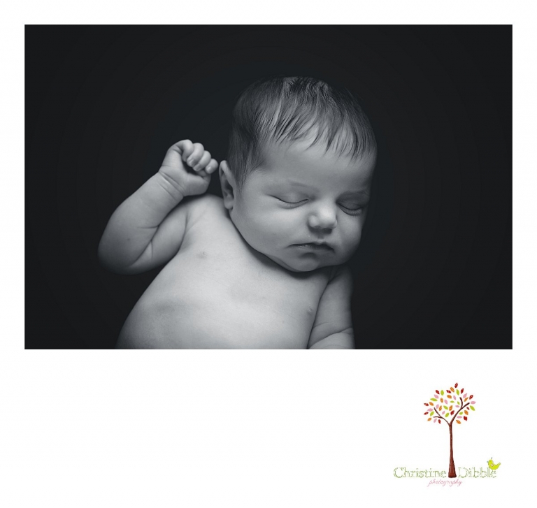 Sonora, CA newborn photography session by best Sonora newborn photographer Christine Dibble Photography includes a photo in black and white of a baby girl as she sleeps.