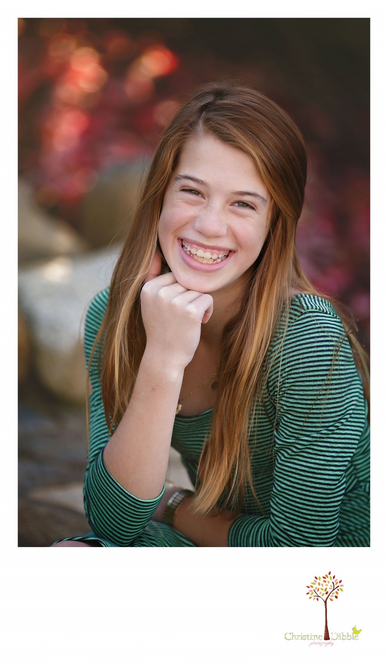 Christine Dibble Photography, best Sonora family photographer, takes individual outdoor portraits of a pre-teen girl during a blended family photo session in their renovated backyard in Tuolumne.