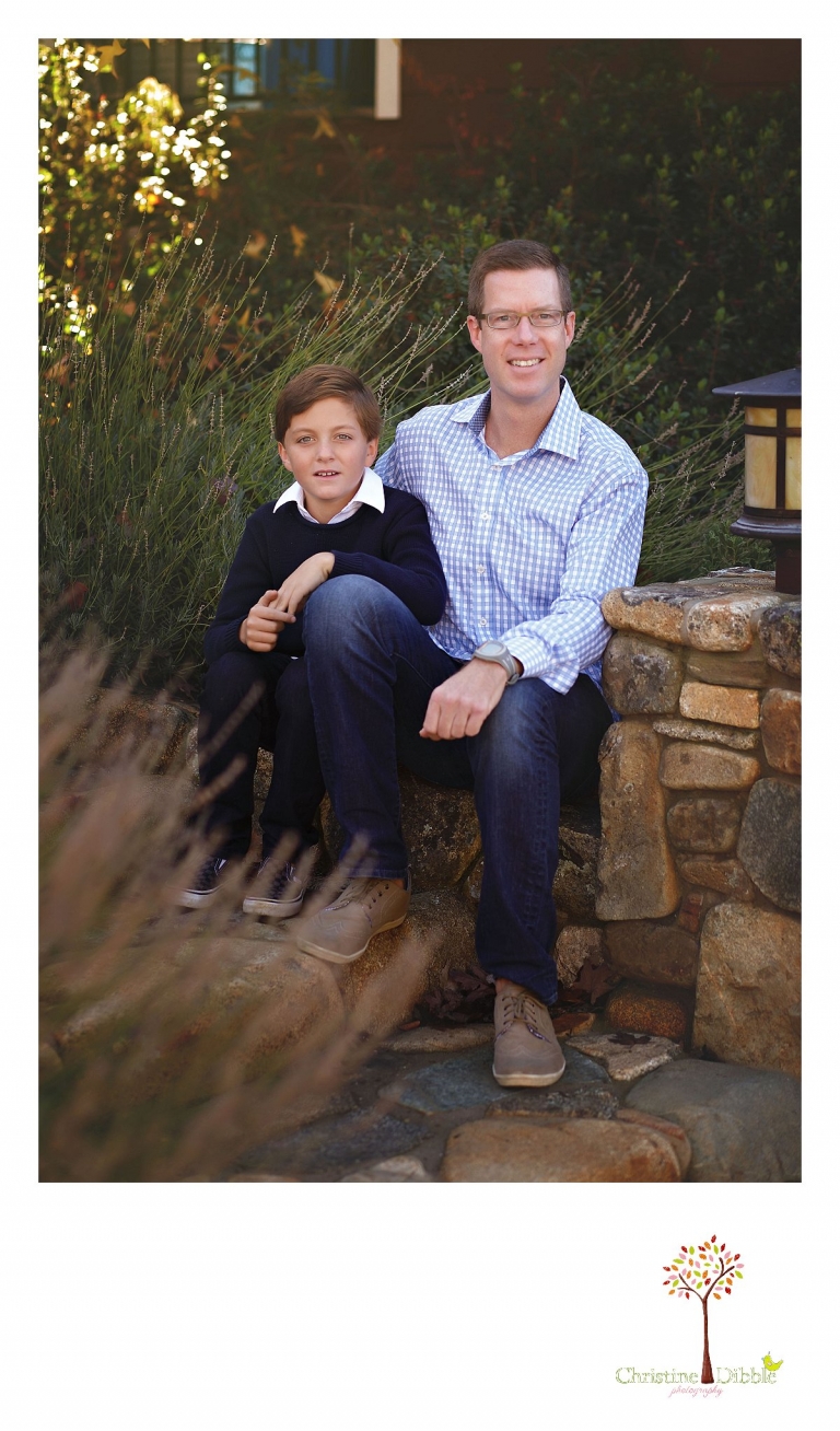 Christine Dibble Photography, best Sonora family photographer, takes outdoor portraits of a father and son in their renovated backyard in Tuolumne.
