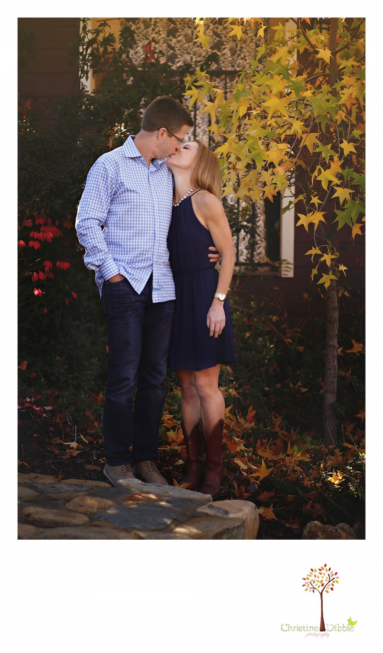 Christine Dibble Photography, best Sonora family photographer, takes outdoor portraits of a newly married couple during a blended family portrait session in their renovated backyard in Tuolumne.