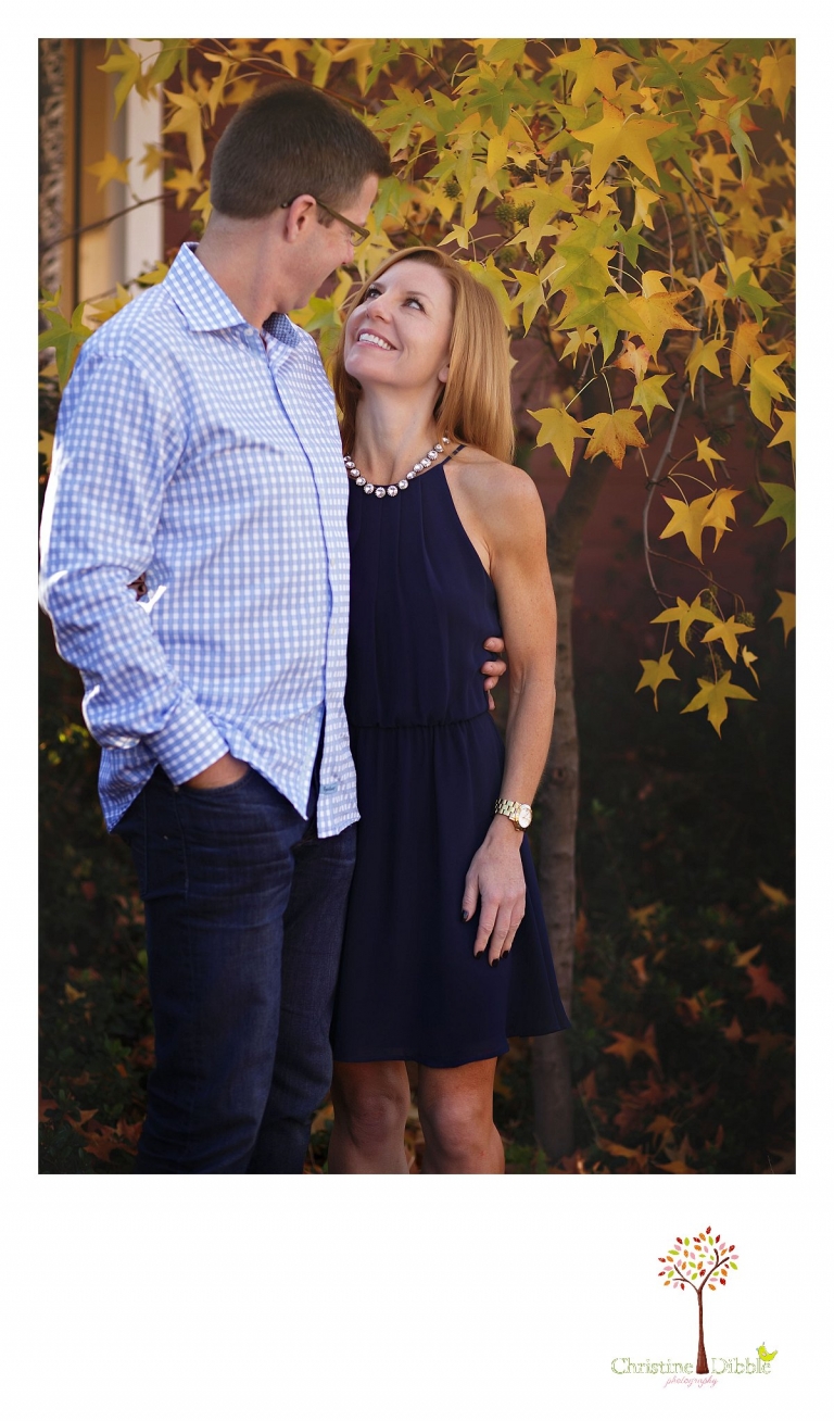Christine Dibble Photography, best Sonora family photographer, takes outdoor portraits of a newly married couple during a blended family portrait session in their renovated backyard in Tuolumne.