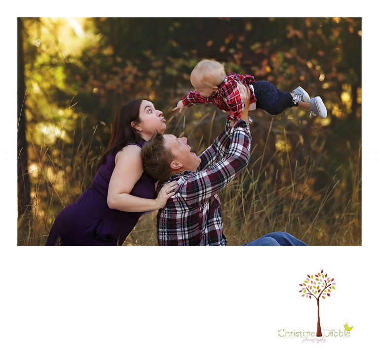 Christine Dibble Photography, child and baby photographer of Sonora, takes first birthday photos of a baby girl in the fall in Twain Harte as she plays with mom and dad making goofy faces.