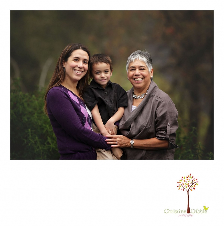 Sonora photographer Christine Dibble Photography takes a photo of three of the four generations during  four generation family portraits outside on a foggy morning in the clients' yard.