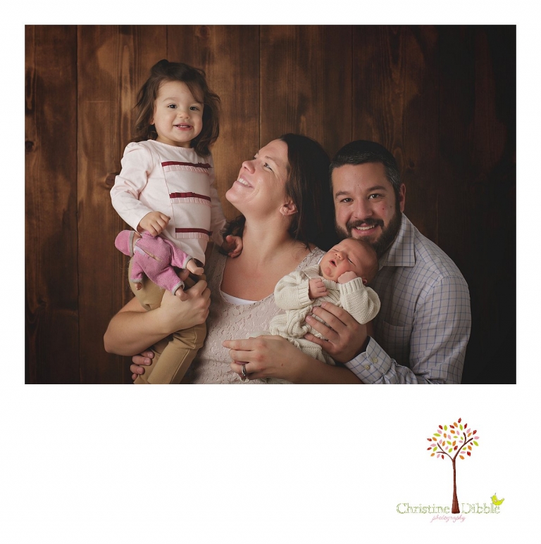 Sonora newborn photographer  Christine Dibble Photography captures a sleeping baby boy as he poses with his family.