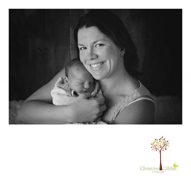 Sonora newborn photographer Christine Dibble Photography takes photos of a baby boy snuggled with his mother.