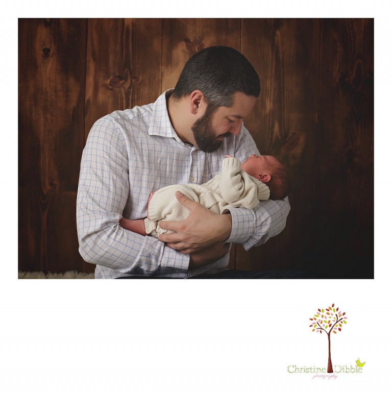 Sonora newborn photographer Christine Dibble Photography takes photos of a baby boy and his dad in a tender moment.