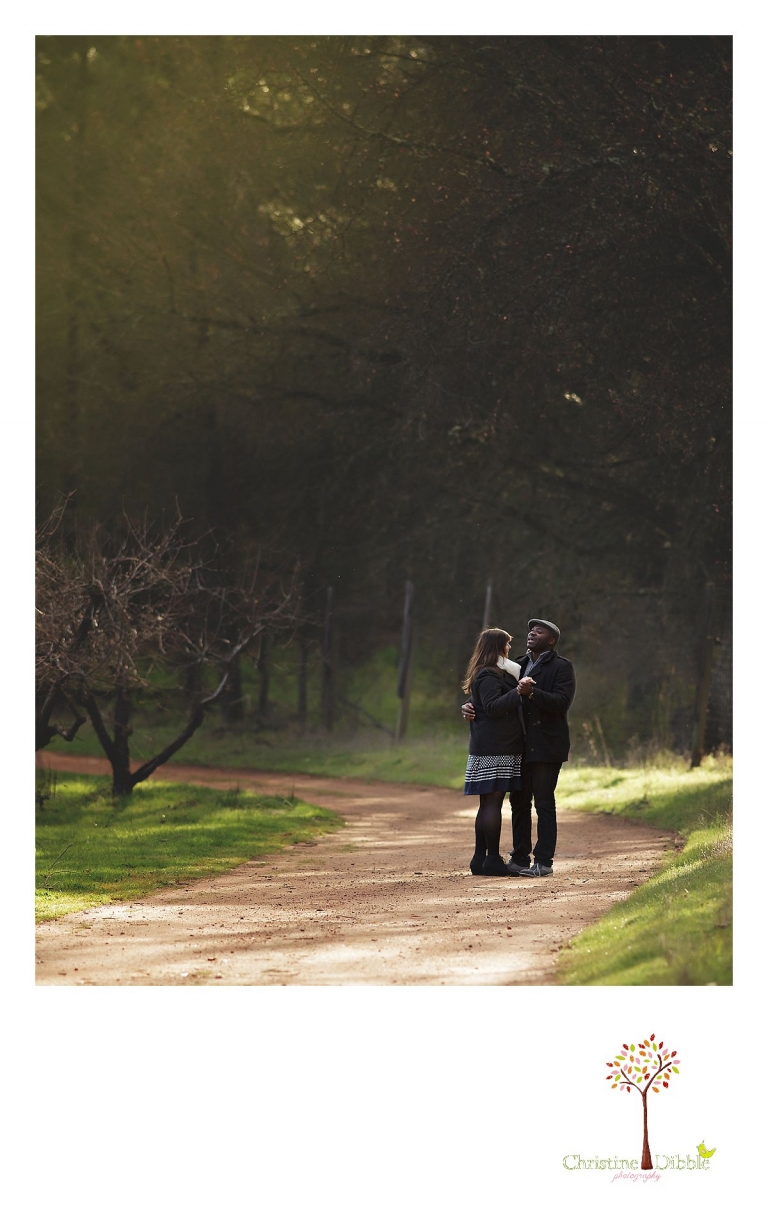 Sonora engagement and wedding photographer Christine Dibble Photography takes photos at Indigeny Reserve as a bride and groom dance on a dirt path.