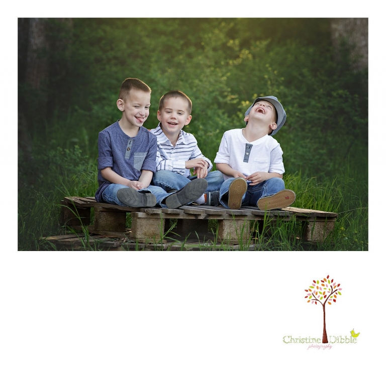 Sonora family photographer Christine Dibble Photography takes outdoor family photos at Indigeny Reserve of boy cousins telling jokes and laughing.