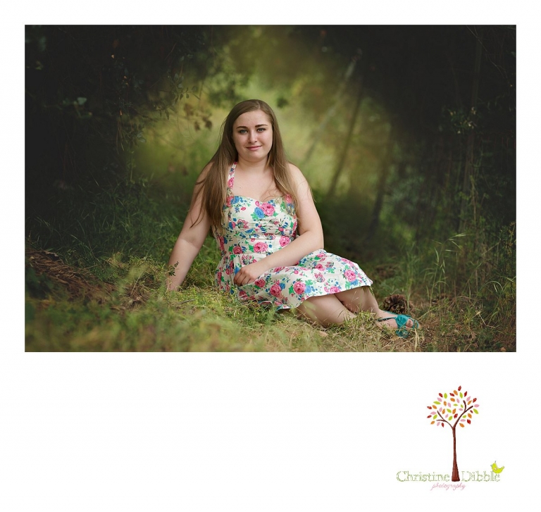 Sonora High senior portrait photographer Christine Dibble Photography takes rich color images of a girl in a backlit, magical forest tunnel near Jamestown.