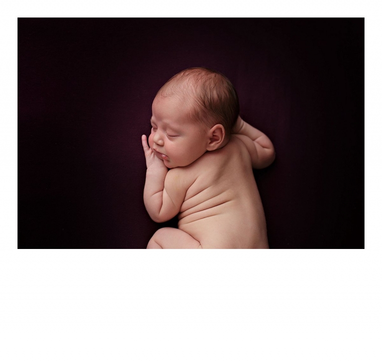 Sonora newborn photographer Christine Dibble Photography takes newborn portraits of a baby girl's back rolls.