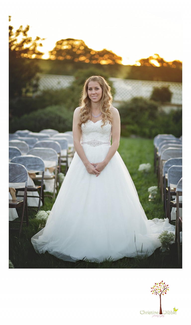 Don Pedro Hacienda photographer Christine Dibble Photography of Sonora takes a photo of the bride as she waits for her groom to turn around and see her during the sunrise first look on their wedding day.