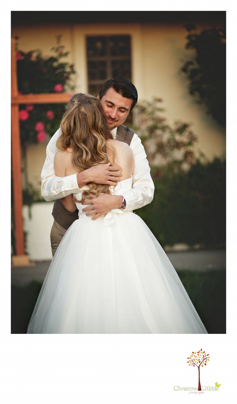 A groom hugs his bride after seeing her for the first time while being photographed by Don Pedro Hacienda photographer Christine Dibble Photography of Sonora.