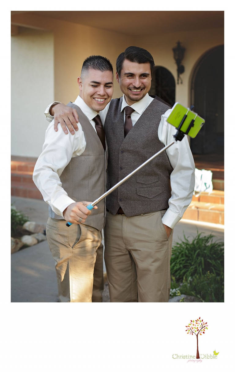 Don Pedro Hacienda photographer, Sonora wedding photographer Christine Dibble Photography takes candid shots of a groom and his groomsman with a selfie stick.