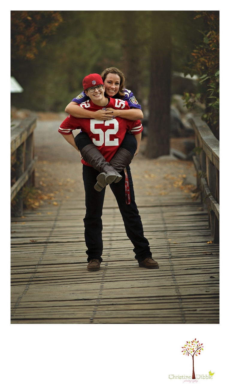 Sonora and Reno family and wedding photographer Christine Dibble Photography captures a couple having fun in rival football jerseys during a couple's session at Galena Park.