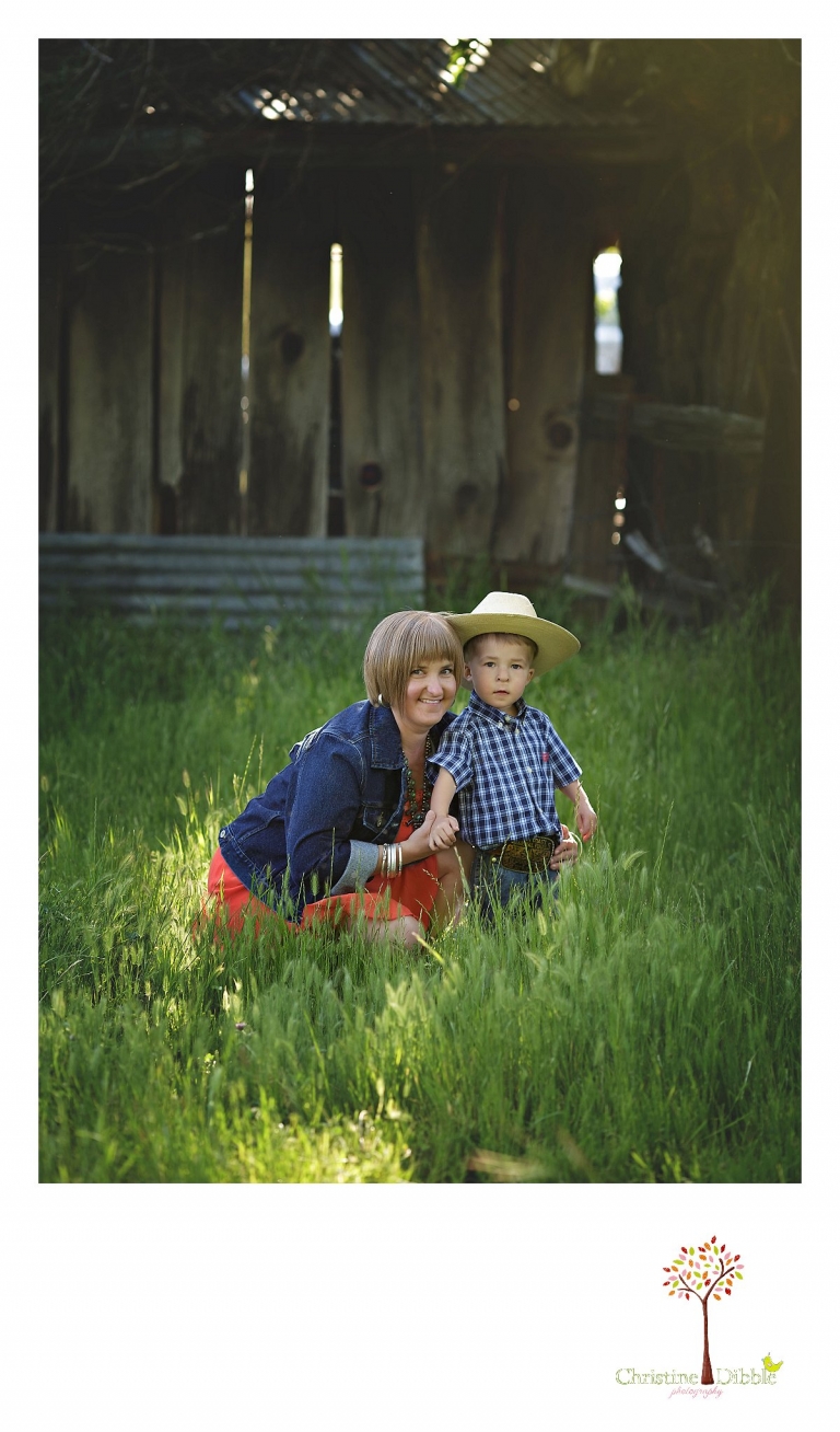 Sonora child photography by Christine Dibble Photography captures a three year old boy and his mom in tall green grass.
