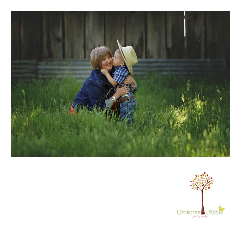 Sonora child photography by Christine Dibble Photography captures a three year old boy kissing his mom on the cheek in a grass field.