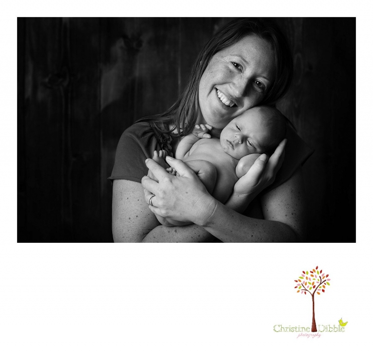 Best Sonora newborn photographer Christine Dibble Photography takes photos of a nine day old baby boy cuddling close to mom's face.