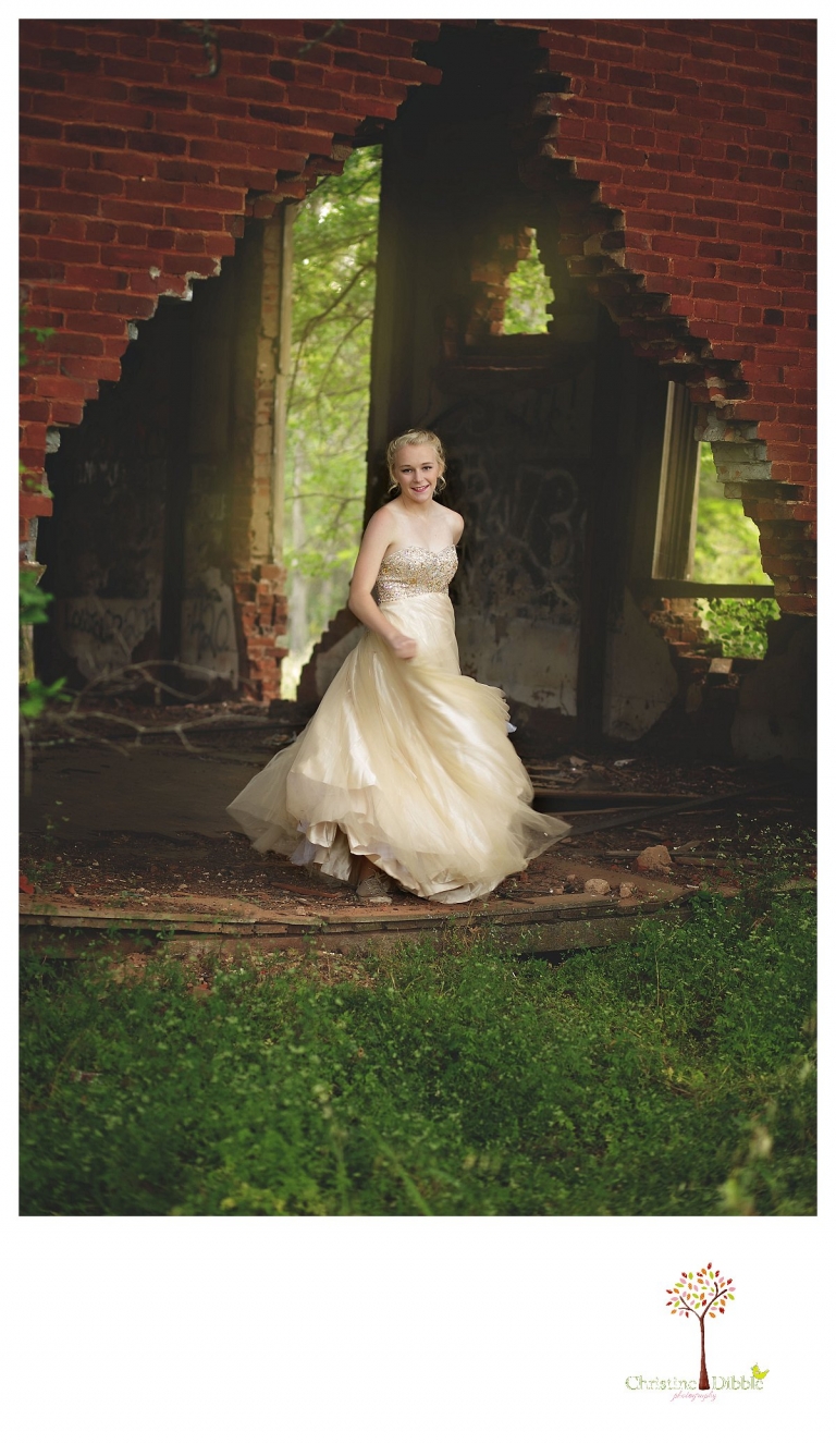 Sonora senior portrait photographer Christine Dibble Photography takes portraits of an eighth grade graduate in a formal gown as she swings and spins in an abandoned school house.