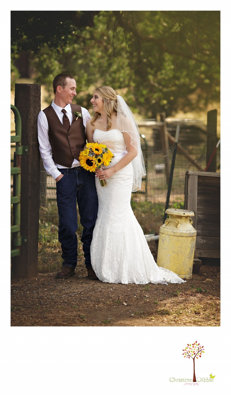 Sonora, CA wedding photography by Christine Dibble Photography takes a photo of a bride and groom smiling at each other after their Mother Lode Ranch wedding.