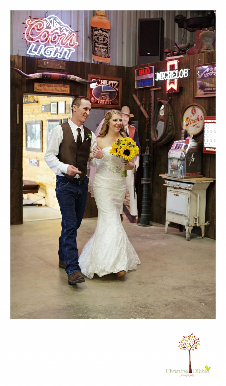 Sonora, CA wedding photographer Christine Dibble Photography captures the bride and groom making their grand entrance in front of John Wayne at their Mother Lode Ranch wedding.