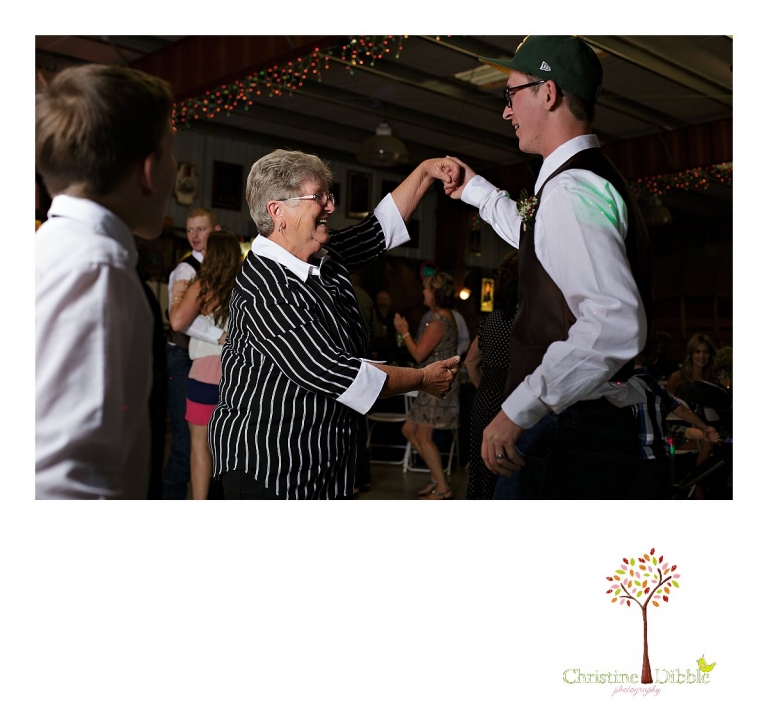 Sonora, CA wedding photographer Christine Dibble Photography photographs a groom as he dances with his grandma.