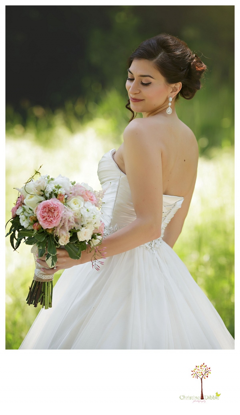 Sonora wedding photographer Christine Dibble Photography photographs a Twain Harte Tree Farm wedding and the bride during bridal portraits.