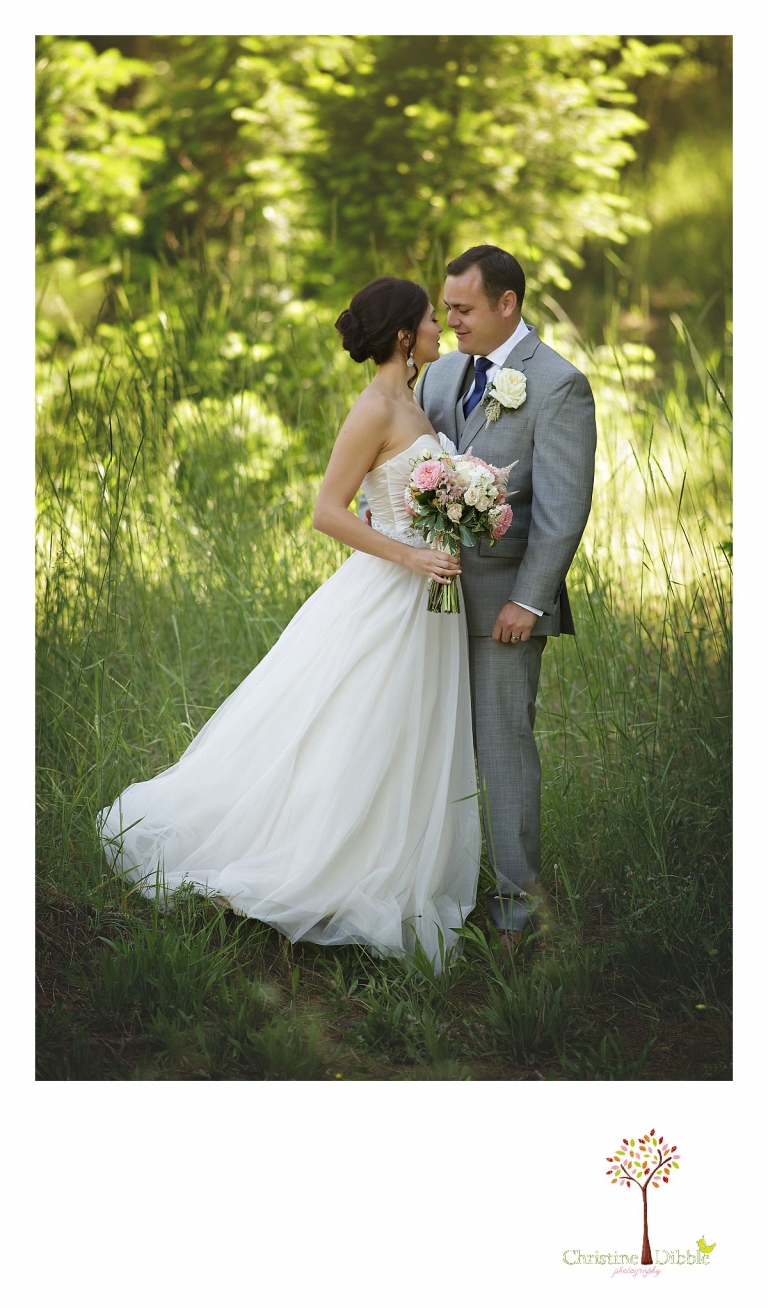 Sonora wedding photographer Christine Dibble Photography photographs a Twain Harte Tree Farm wedding and the bride and groom during couple's portraits.
