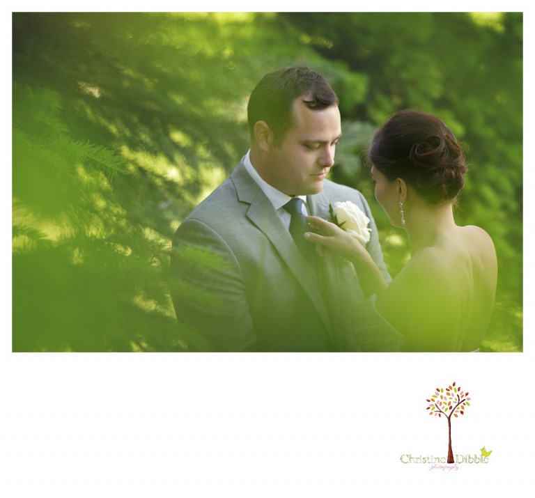 Sonora wedding photographer Christine Dibble Photography photographs a Twain Harte Tree Farm wedding and the bride and groom as they steal a moment alone.