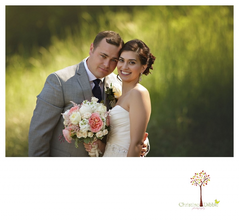 Sonora wedding photographer Christine Dibble Photography photographs a Twain Harte Tree Farm wedding and the bride and groom with a long lens for creamy bokeh.